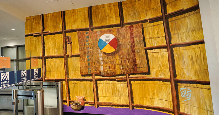 Robert Peters, an artist and member of the Mashpee Wampanoag Tribe, created a mural in UMass Boston’s first residence hall.