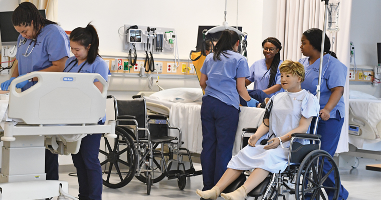 Students in sim lab